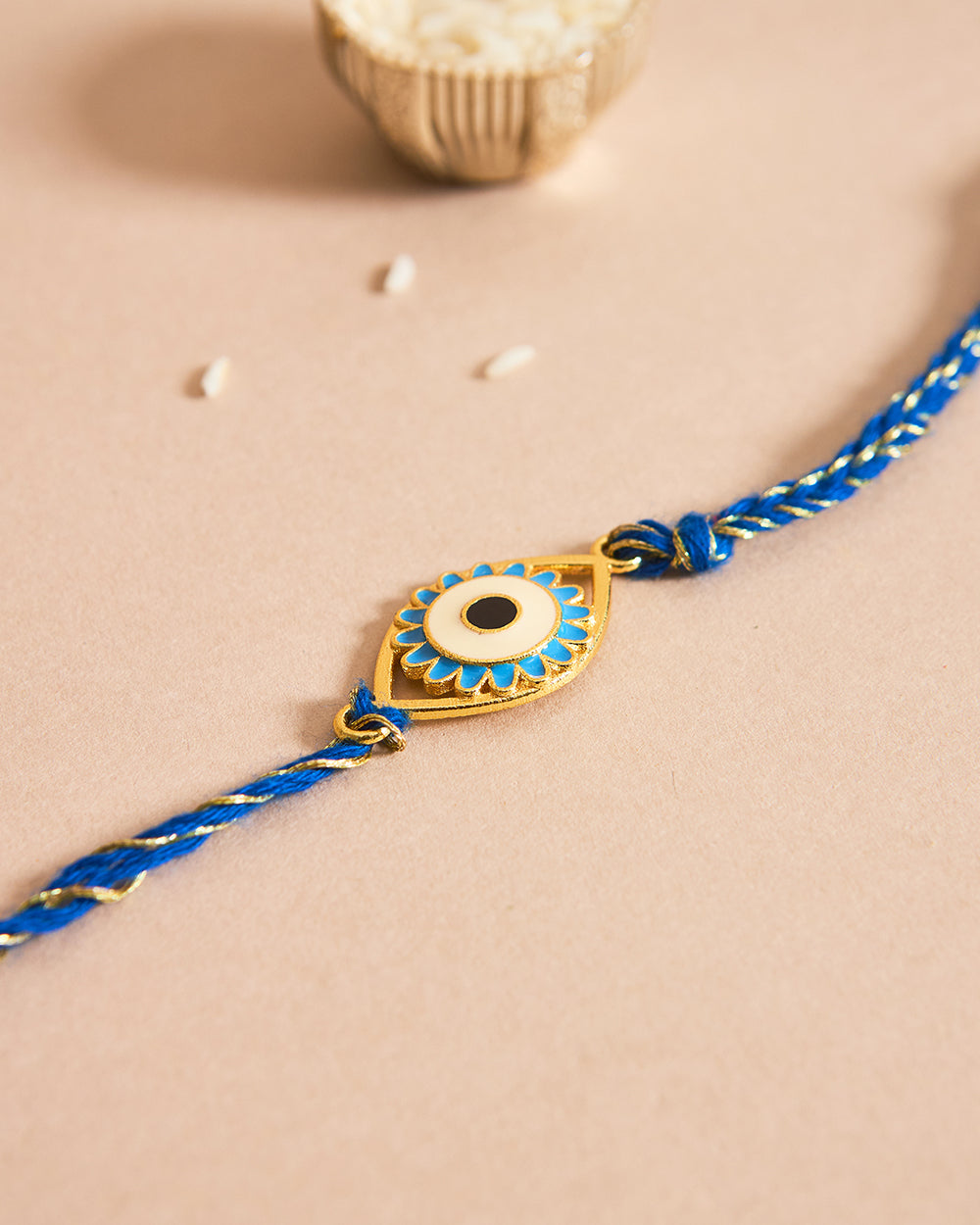 Evil-Eye Blue Rakhi - Brass Motif